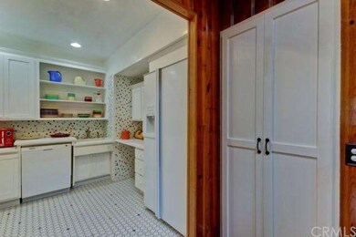 Light and bright kitchen remodel includes a pantry