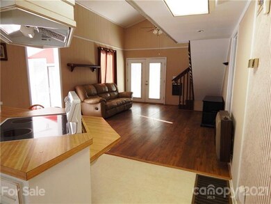 From side entry, view of kitchen and family room