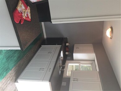 Kitchen - (plastic walk way on floor in green)