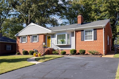 View of front exterior: freshly painted shutters &
