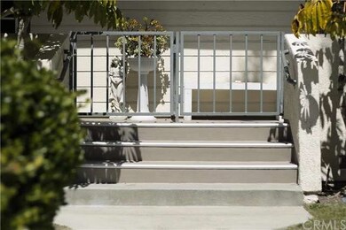 Gated front patio adds privacy & safety for the li