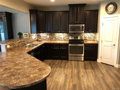 Beautiful kitchen with sweeping work surface and a