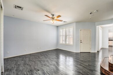 Living room looking towards the front door and kit