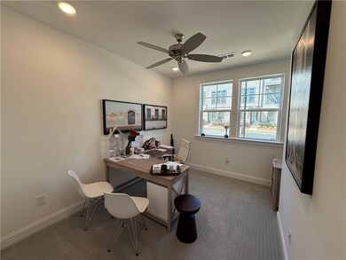 Carpeted office featuring recessed lighting, visib
