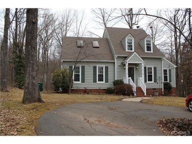 Exterior Front. Paved roundabout driveway. End of 