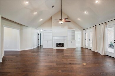 Large Den with High Ceilings and Fireplace
