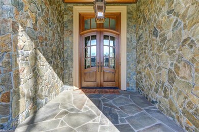 As you enter onto the front steps you'll immediately get a luxurious sense of what this home is all about!