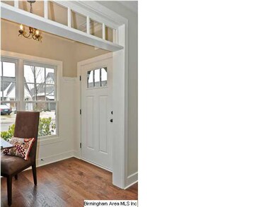 This is the view of the foyer. **Photo is of a com