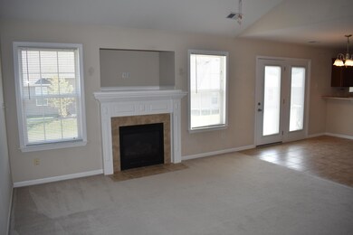living room w/ gas fireplace