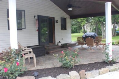 Covered stamped patio with fan*
