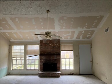 Wood  burning center fireplace