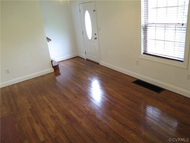 Your living room comes with Natural light, Wood fl