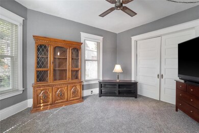 Sitting room could be converted into a den or office space