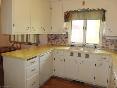 Kitchen with dishwasher.