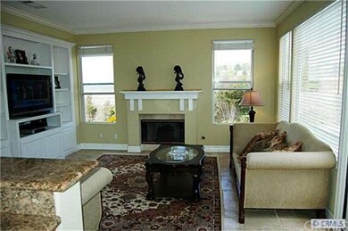 Light, open family room with fireplace.