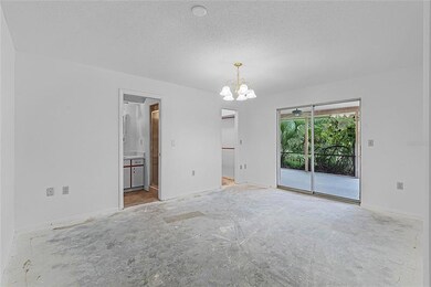 MASTER BEDROOM W/ CASCANG SLIDERS ONTO LANAI