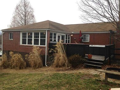 Exterior Back. Another View from the Yard with Dec