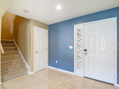 Coat closet and stairs to 2nd Floor