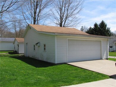 DETACHED GARAGE 2 ACCESS DOORS PAVED DRIVE.  GARAG