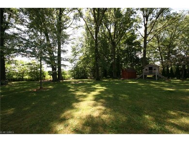Back yard view. Shed and playhouse remain.