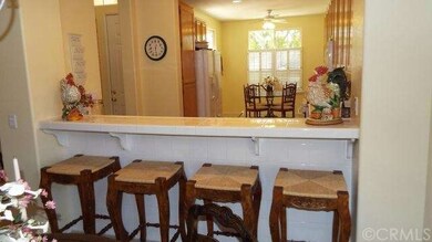 Breakfast bar with custom tile front.
