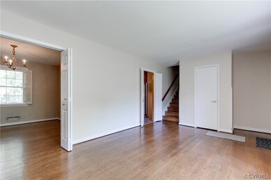 Large front living room with gorgeous hardwood flo