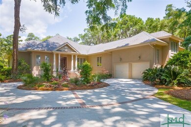 Full two car garage plus a spot for your golf cart