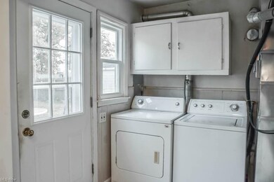 First floor laundry with backyard access.