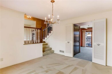 Formal dining room opens to the kitchen and breakf