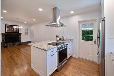 Completely renovated kitchen with all new stainless steel appliances, granite countertops and soft close solid wood cabinets