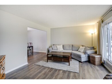 Bright and cheery living room off main entry