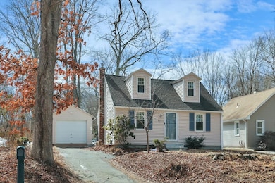 Notice the full size detached garage.