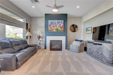 Family Room w/Fireplace that has a blower for thos