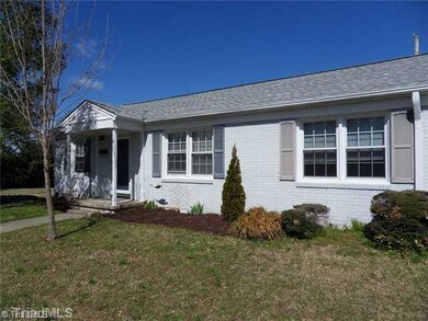 Exterior Front. Beautiful landscaping and covered front porch
