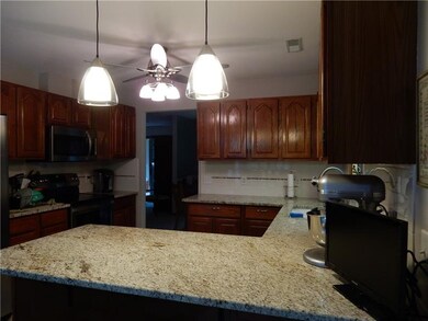 Stainless microwave and electric stove