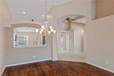Dining Room View to Guest Room, Foyer and Kitchen