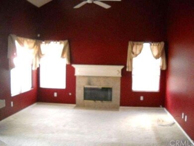 FAMILY ROOM WITH HIGH CEILINGS AND FIREPLACE