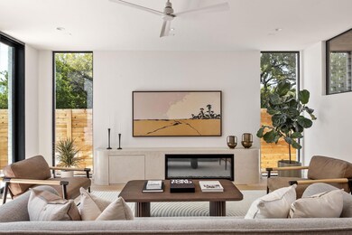 Living room with a wealth of natural light, expan