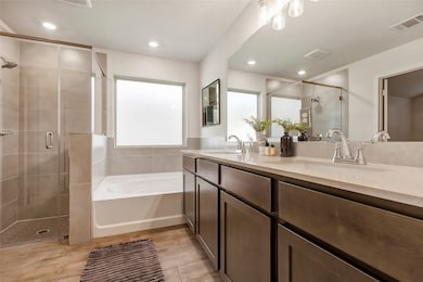 Features a private ensuite layout with modern fixt