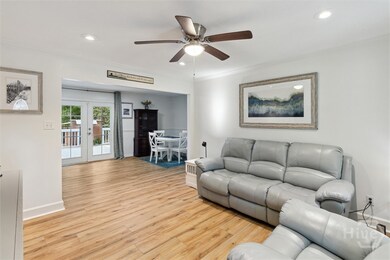 Expanded Entry Creates Open Flow From Living Room