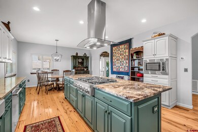 The kitchen is an absolute showstopper, boasting a magnificent large island & brand new appliances.