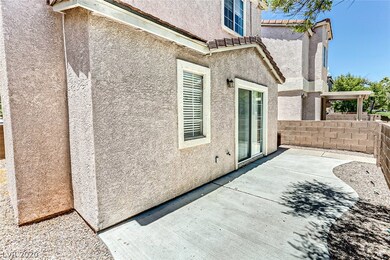 Entry from community walkway to property with larg
