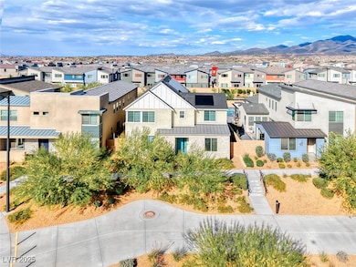 Aerial view of residential area with a mountain ba