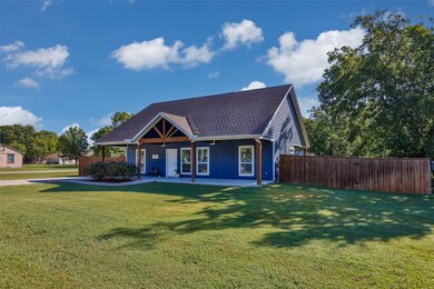 View of front of house with a front lawn