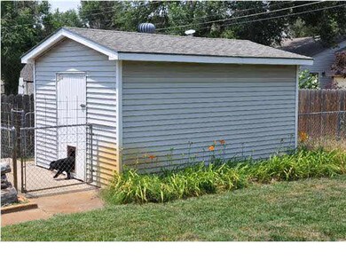 Storage shed and dog run