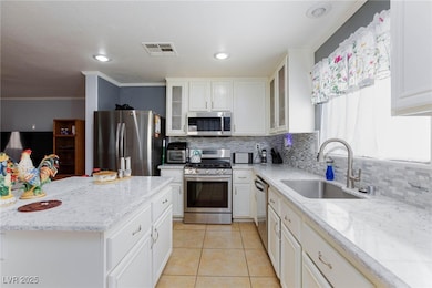 Kitchen featuring appliances with stainless steel
