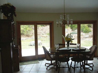 Dining Room. Two sets of French doors open from th