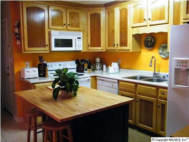 What a great kitchen! The moveable work island will be staying!