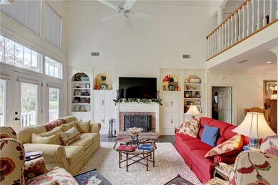 Family Room with gas log fireplace, built-in book