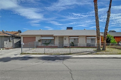 Ranch-style house featuring stucco siding, a garag